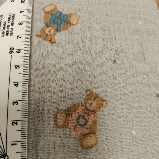 Double gauze  material printed with small bears green
