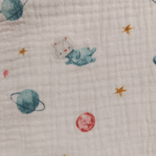 Tissu double gaze de coton  imprimé planètes coloris blanc