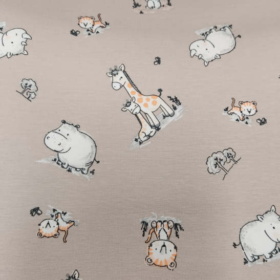 Jersey printed material with girafe and hippo color beige