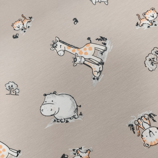 Jersey printed material with girafe and hippo color beige