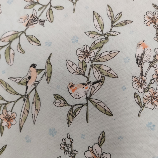 Tissu coton imprimé chants d'oiseaux coloris ciel