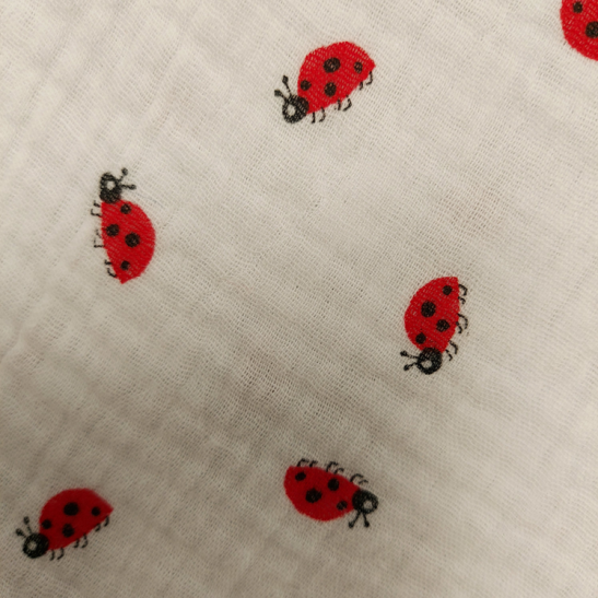 Tissu double gaze de coton imprimé petites coccinelles
