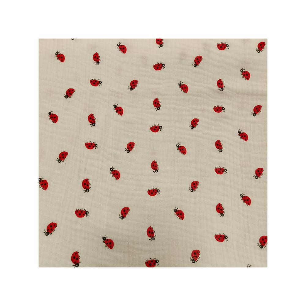 Tissu double gaze de coton imprimé petites coccinelles