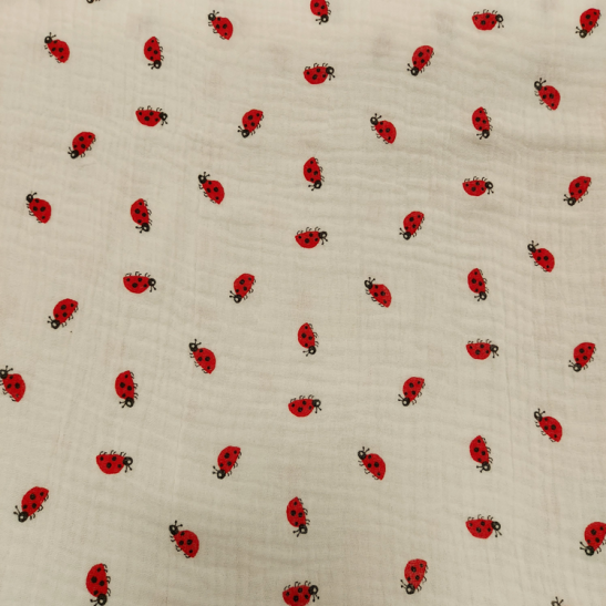 Tissu double gaze de coton imprimé petites coccinelles