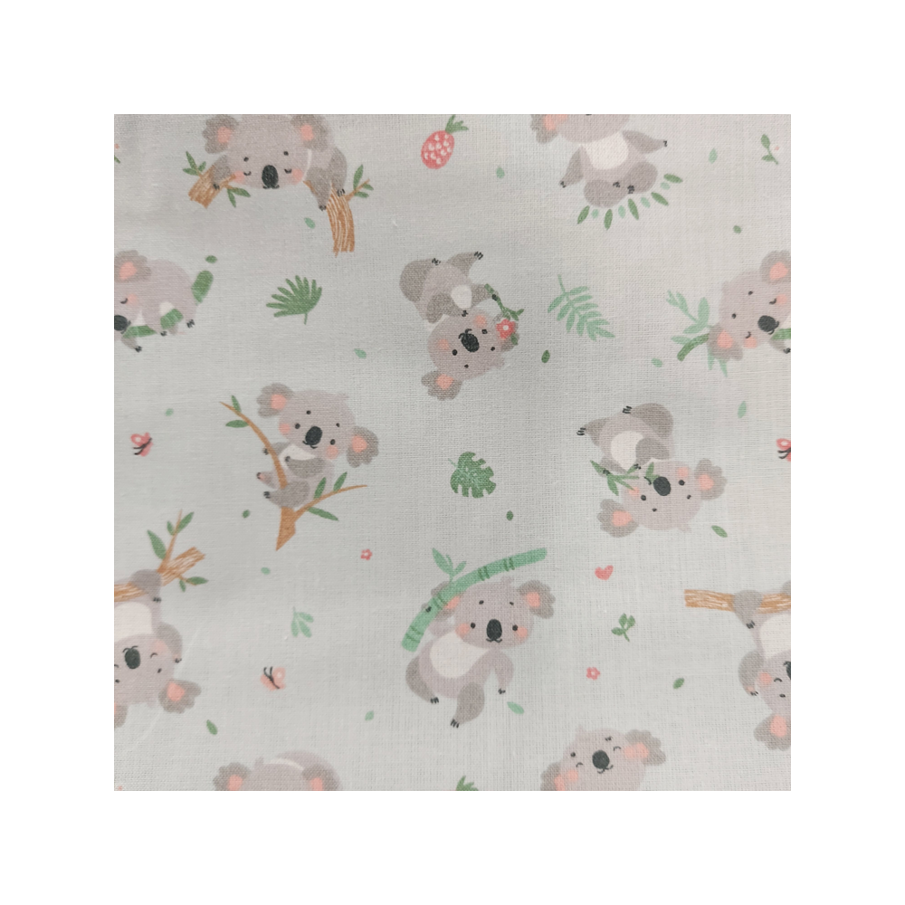 Tissu coton enfant imprimé koala fond bleu ciel