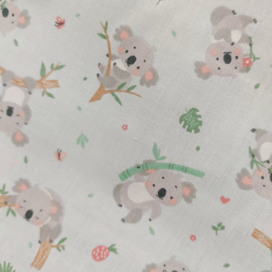 Cotton material  print with koala color light blue