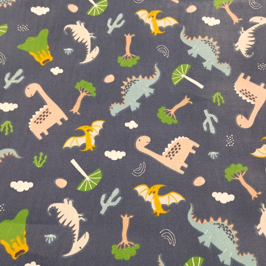 Tissu coton enfant imprimé dinosaure fond bleu marine