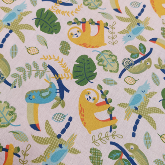 Tissu coton enfant imprimé paresseux et toucans