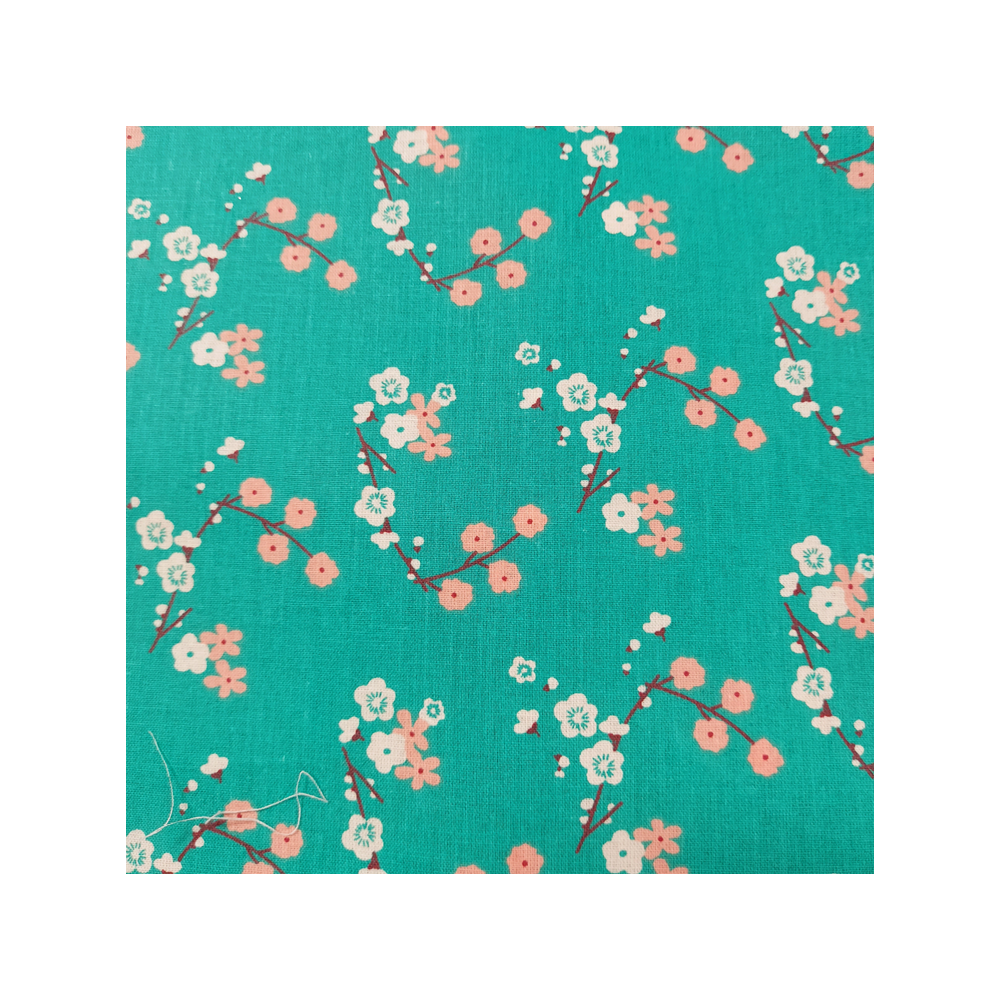 Tissu coton imprimé fleurs de cerisier coloris vert