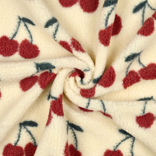 Tissu teddy sherpa imprimé cerises fond écru