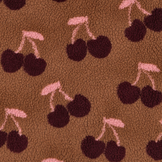 Tissu teddy sherpa imprimé cerises fond marron
