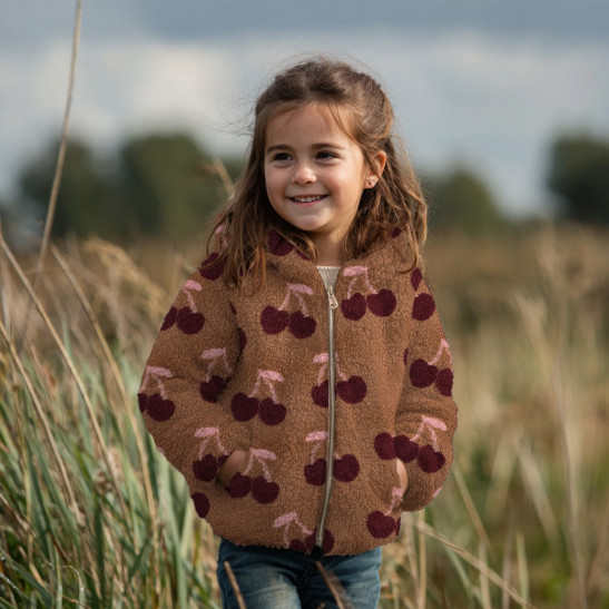 Tissu teddy sherpa imprimé cerises fond marron