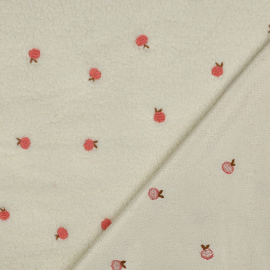 Tissu sherpa brodé pêches coloris écru