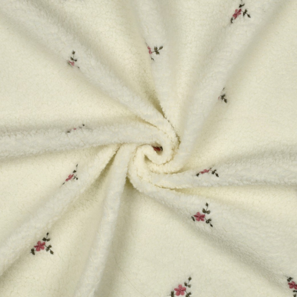 Tissu sherpa brodé fleurs coloris écru
