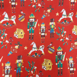 Tissu Noël Safeco coton imprimé casse noisette coloris rouge